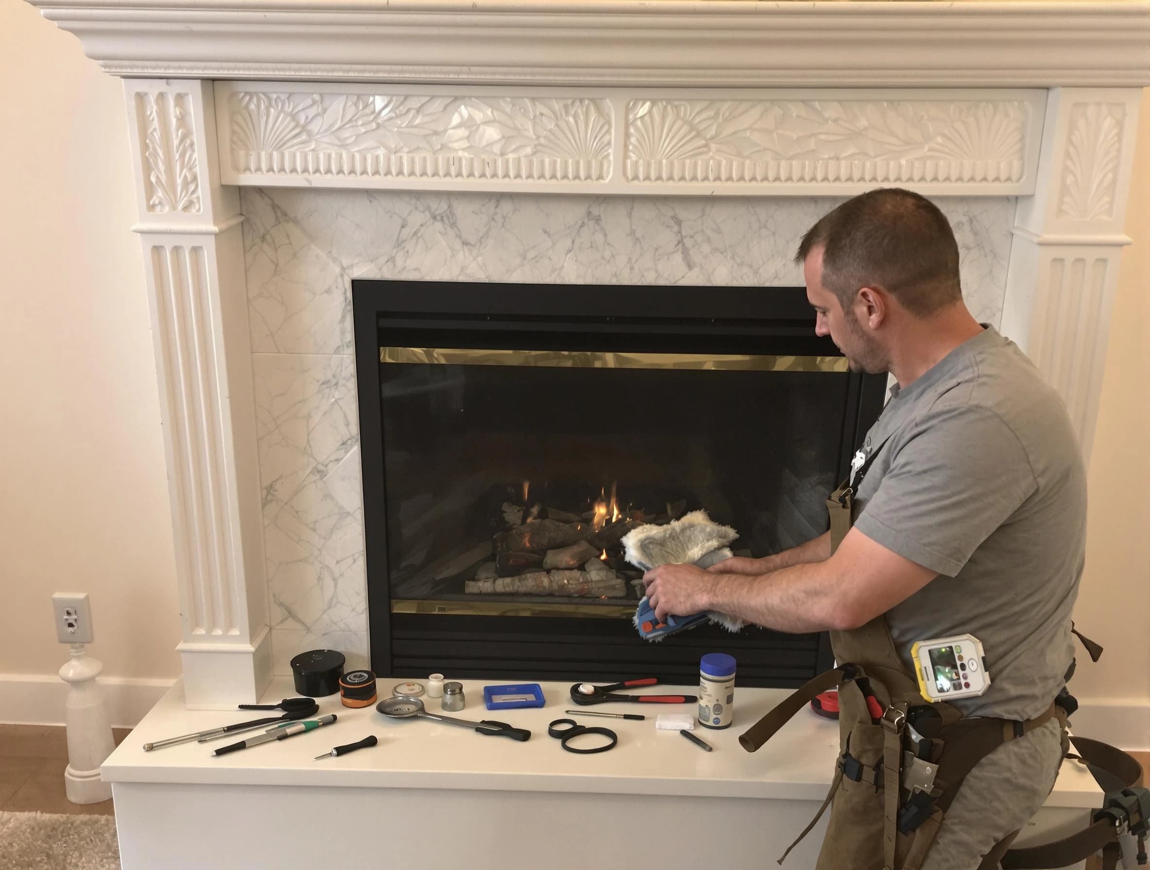 Falmouth Chimney Sweep performing fireplace maintenance in Falmouth, VA